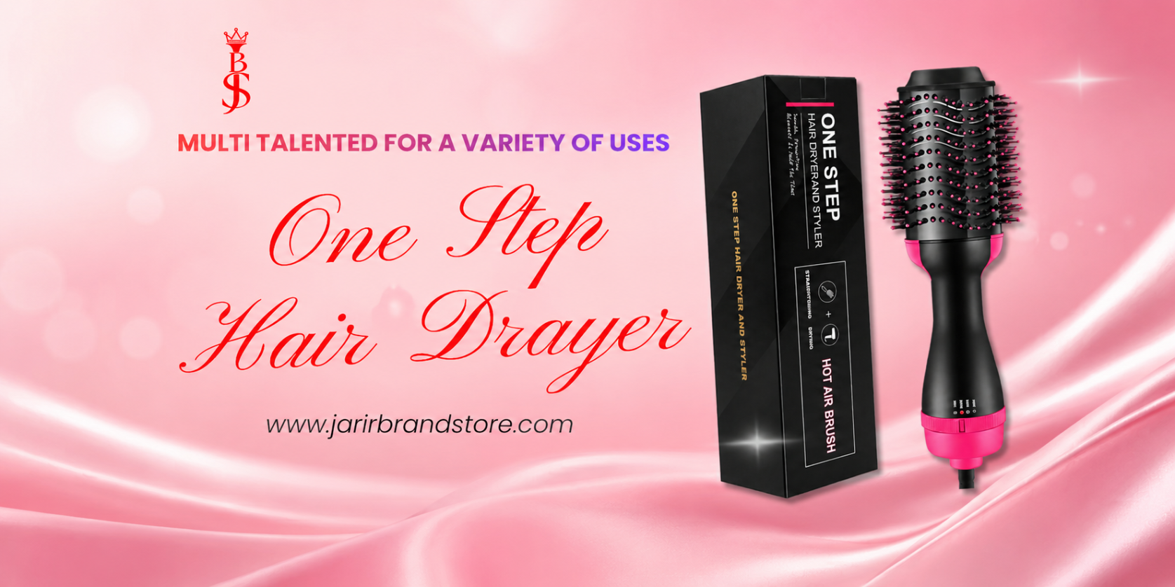 A black and pink hot air brush hair dryer shown next to its black packaging box on a pink satin background with promotional text reading 'One Step Hair Drayer' and 'www.jariribrandstore.